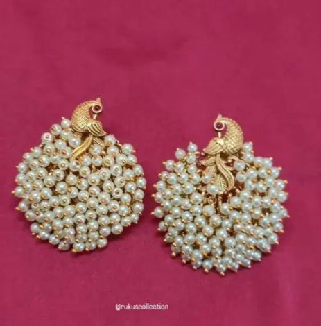 WHITE PEARLS PEACOCK STUDS Breathtaking Peacock Bunch Earrings for Timeless Glamour - Temple Matte Gold Plated Cluster Pearl Golden Peacock Studs Peacock Designer Pearls Earrings Set for Women And Girls Brass Stud Earring